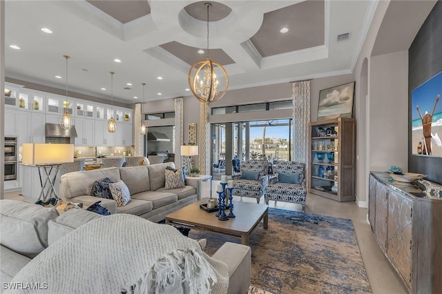 living area with a high ceiling, visible vents, coffered ceiling, and crown molding