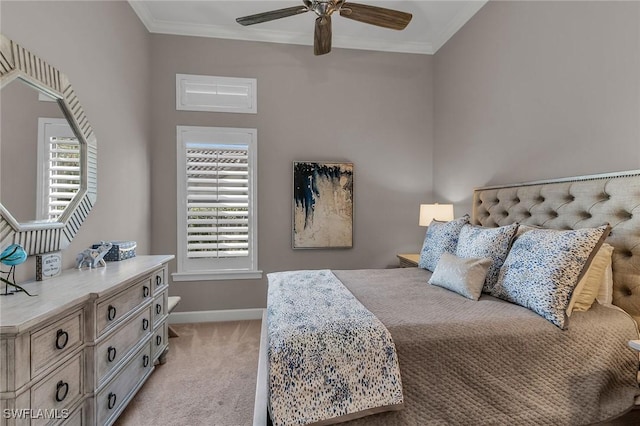 bedroom with crown molding, ceiling fan, baseboards, and light colored carpet