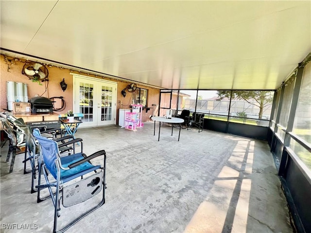 sunroom featuring french doors