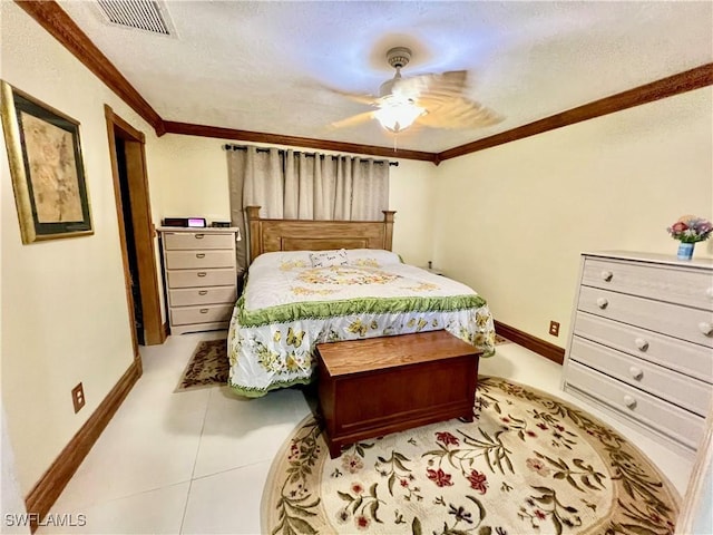 bedroom featuring visible vents, baseboards, ceiling fan, ornamental molding, and light tile patterned flooring