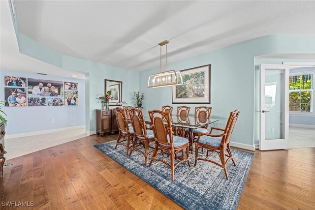 dining room with wood finished floors and baseboards