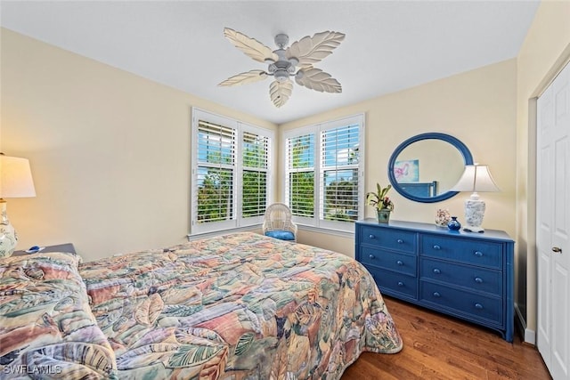 bedroom with wood finished floors and a ceiling fan