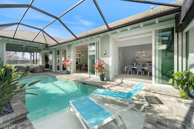 pool featuring a patio area and an outdoor living space