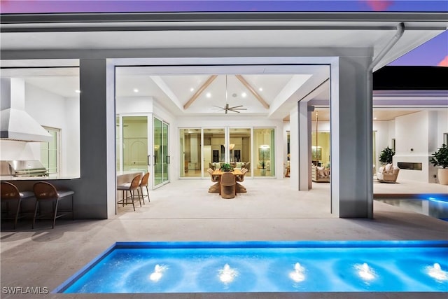 interior space featuring ceiling fan and a grill