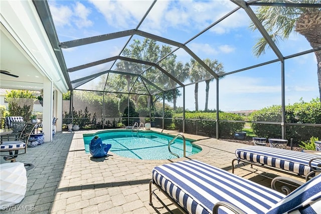 pool with a patio and a lanai