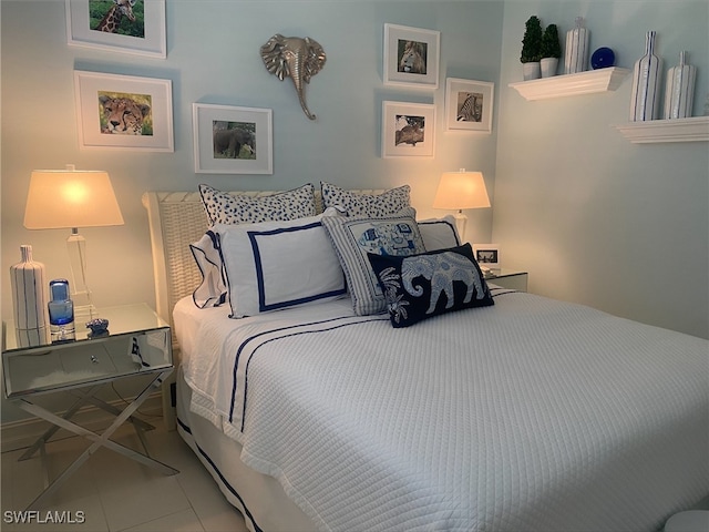 bedroom featuring tile patterned floors