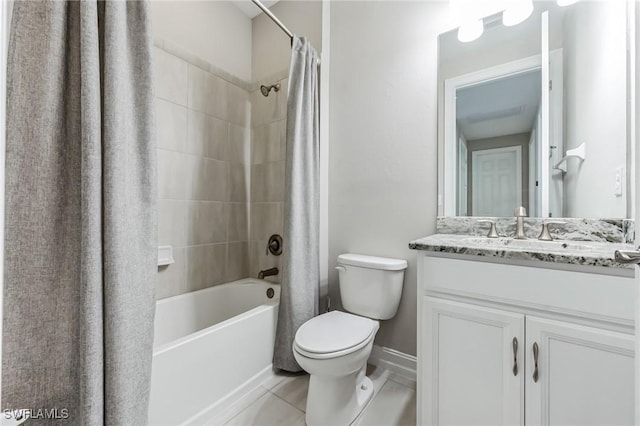 bathroom with shower / bath combination with curtain, vanity, toilet, and tile patterned floors