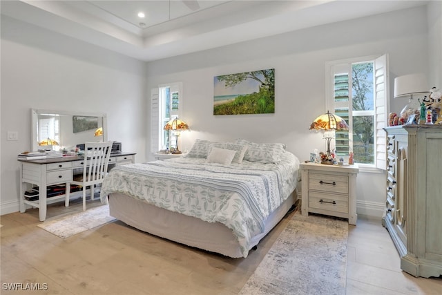 bedroom featuring recessed lighting and baseboards