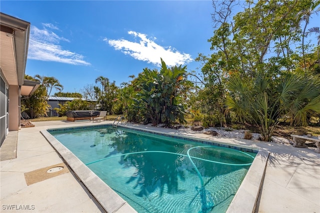 pool with a patio