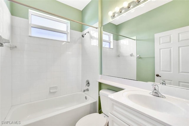 full bathroom with washtub / shower combination, vanity, and toilet