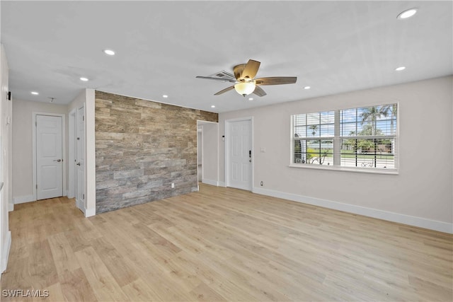 unfurnished room with baseboards, ceiling fan, wood finished floors, and recessed lighting