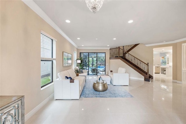 living area with a healthy amount of sunlight, stairway, and crown molding