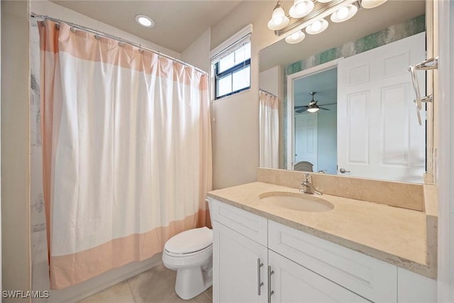 full bathroom featuring toilet, curtained shower, vanity, and tile patterned floors