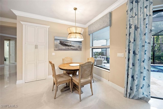 dining room featuring baseboards, light tile patterned floors, and crown molding