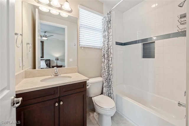 bathroom featuring shower / tub combo, toilet, ceiling fan, tile patterned flooring, and vanity