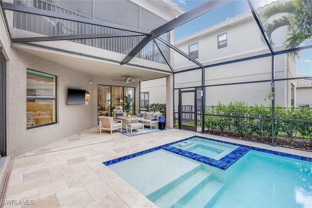 view of pool with glass enclosure, an outdoor living space, and a patio