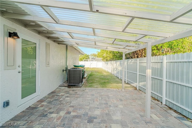 view of patio with central AC and a fenced backyard