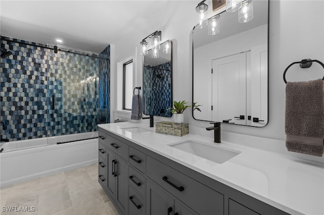 full bathroom with a sink, bathing tub / shower combination, double vanity, and tile patterned flooring