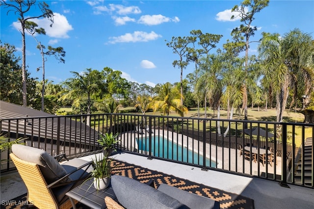 exterior space with a fenced in pool