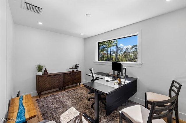 office with recessed lighting, wood finished floors, visible vents, and baseboards