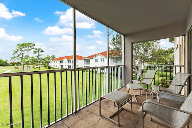 balcony featuring a residential view