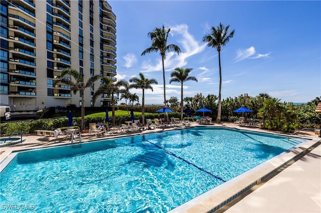 720 S Collier Blvd Unit 1007, Marco Island, FL 34145 - community pool featuring a patio