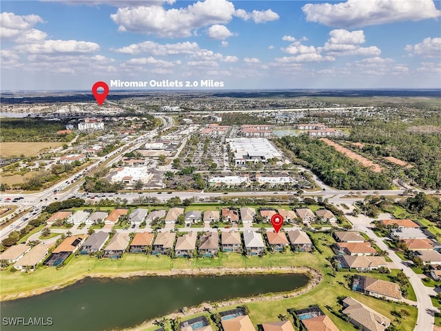 bird's eye view featuring a residential view and a water view