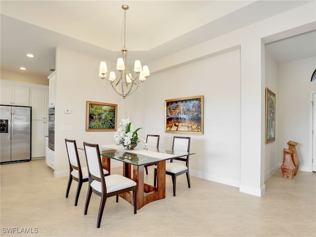 dining area with baseboards, a notable chandelier, and recessed lighting