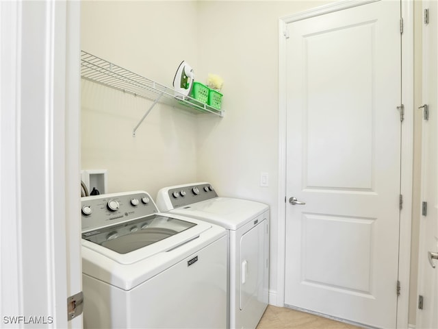 laundry area with laundry area and washing machine and dryer