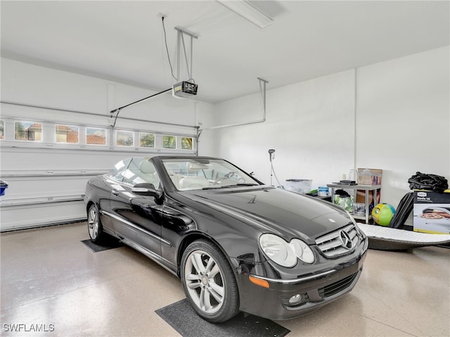 garage featuring a garage door opener