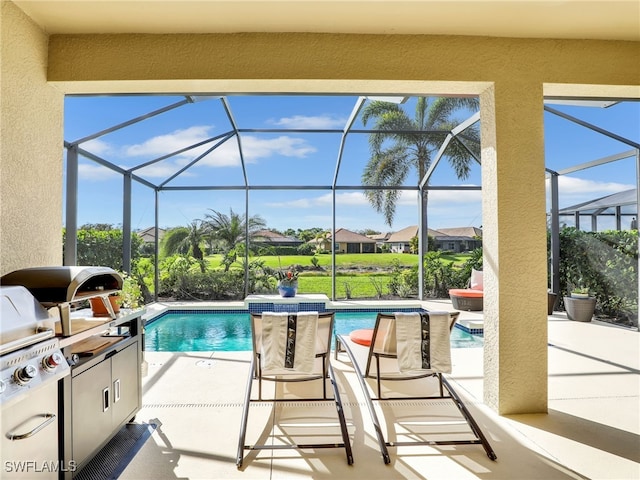 pool featuring area for grilling, a patio area, and a lanai