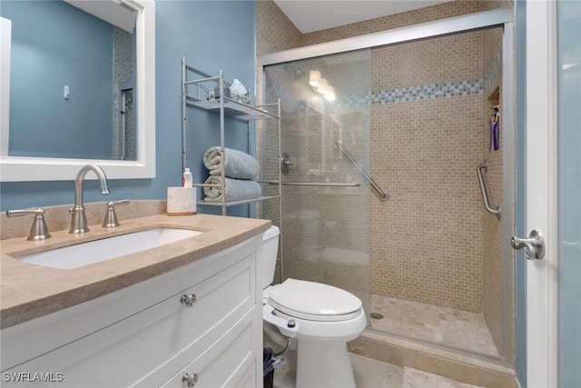 full bath with toilet, a shower stall, and vanity