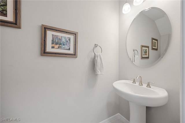 bathroom featuring baseboards