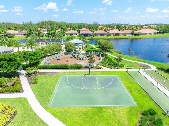 bird's eye view with a residential view and a water view