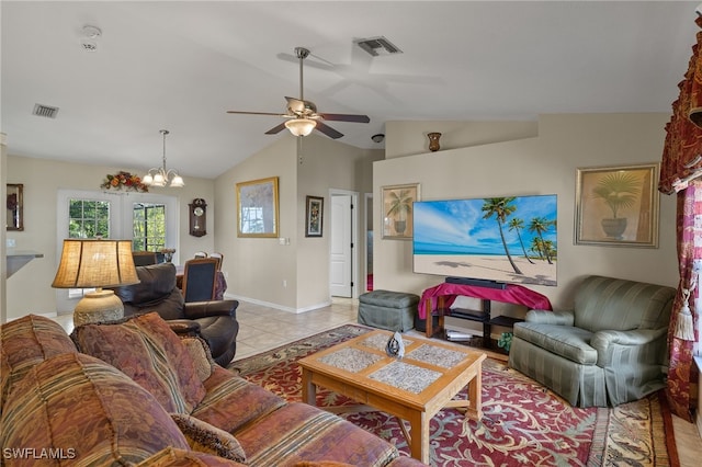 living room with ceiling fan with notable chandelier, lofted ceiling, visible vents, and light tile patterned flooring