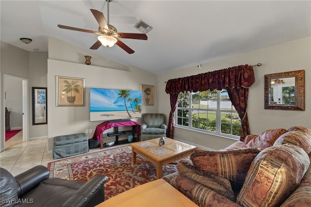 living room featuring vaulted ceiling, a ceiling fan, visible vents, and tile patterned floors