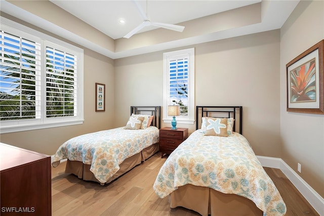 bedroom featuring recessed lighting, baseboards, light wood-style floors, and a ceiling fan