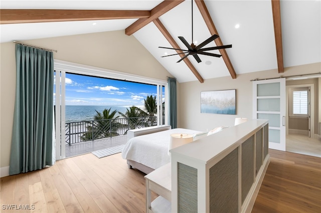 bedroom featuring a water view, beam ceiling, wood finished floors, high vaulted ceiling, and access to outside