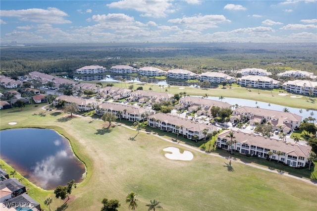 aerial view with a water view, a residential view, and golf course view