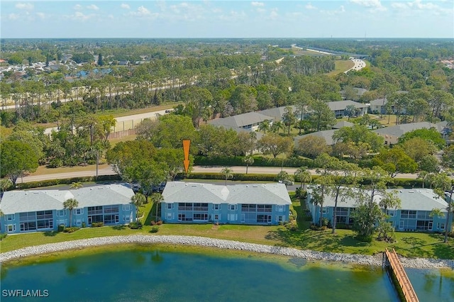 bird's eye view with a water view and a residential view