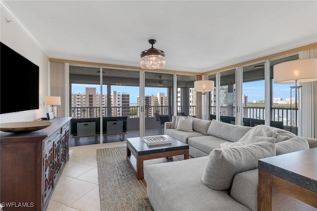 living room featuring a view of city, plenty of natural light, and light tile patterned floors