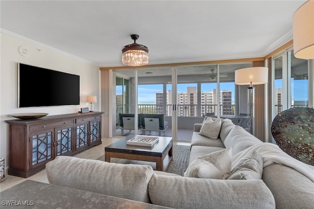 tiled living area with a view of city, a chandelier, and crown molding