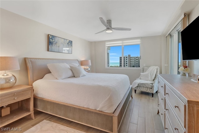 bedroom featuring ceiling fan and wood finished floors