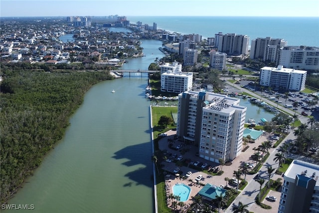 bird's eye view with a view of city and a water view