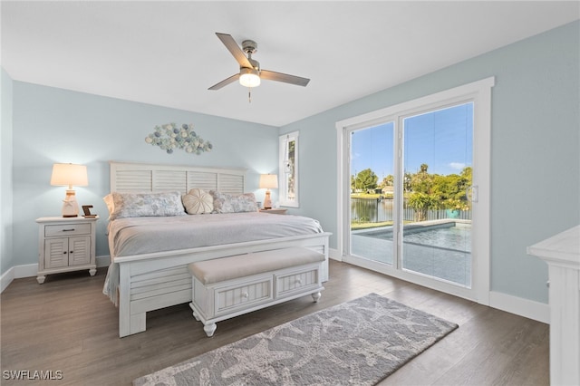 bedroom featuring access to exterior, a ceiling fan, baseboards, and wood finished floors