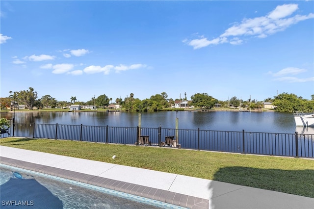 view of water feature with fence