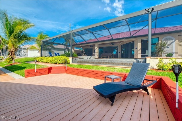 deck with ceiling fan and a lanai