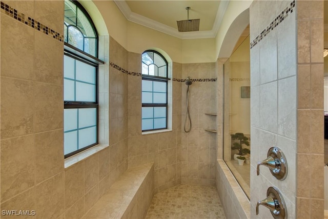 full bathroom with ornamental molding and walk in shower