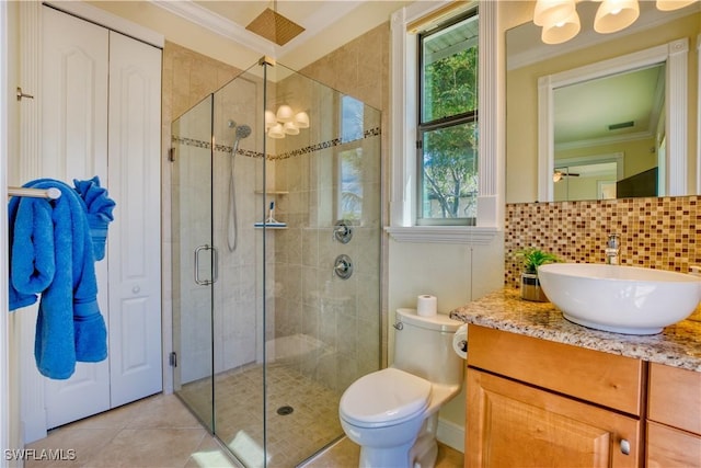 full bath featuring a stall shower, ornamental molding, decorative backsplash, and vanity