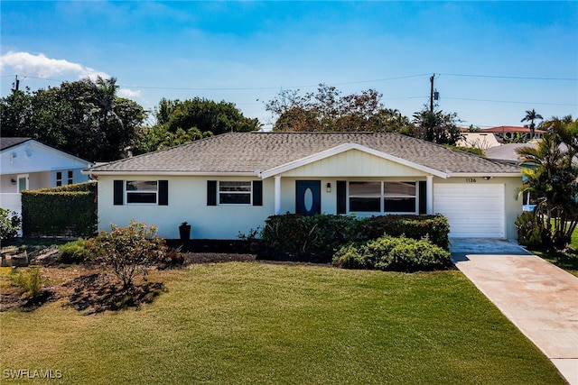 single story home featuring driveway, a front lawn, a shingled roof, and stucco siding